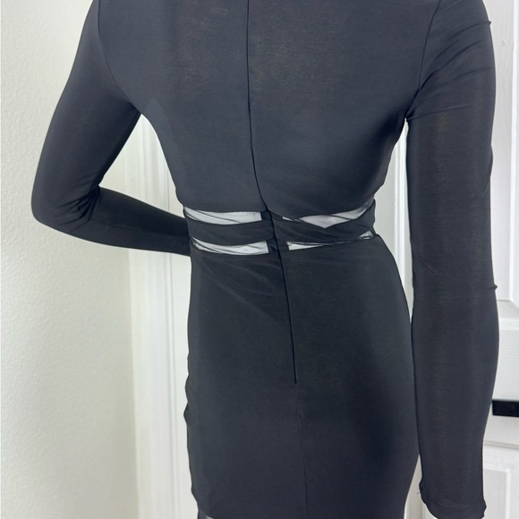 Bebe Elegant Black Sheer Panel Dress. D35 - Picture 10 of 15